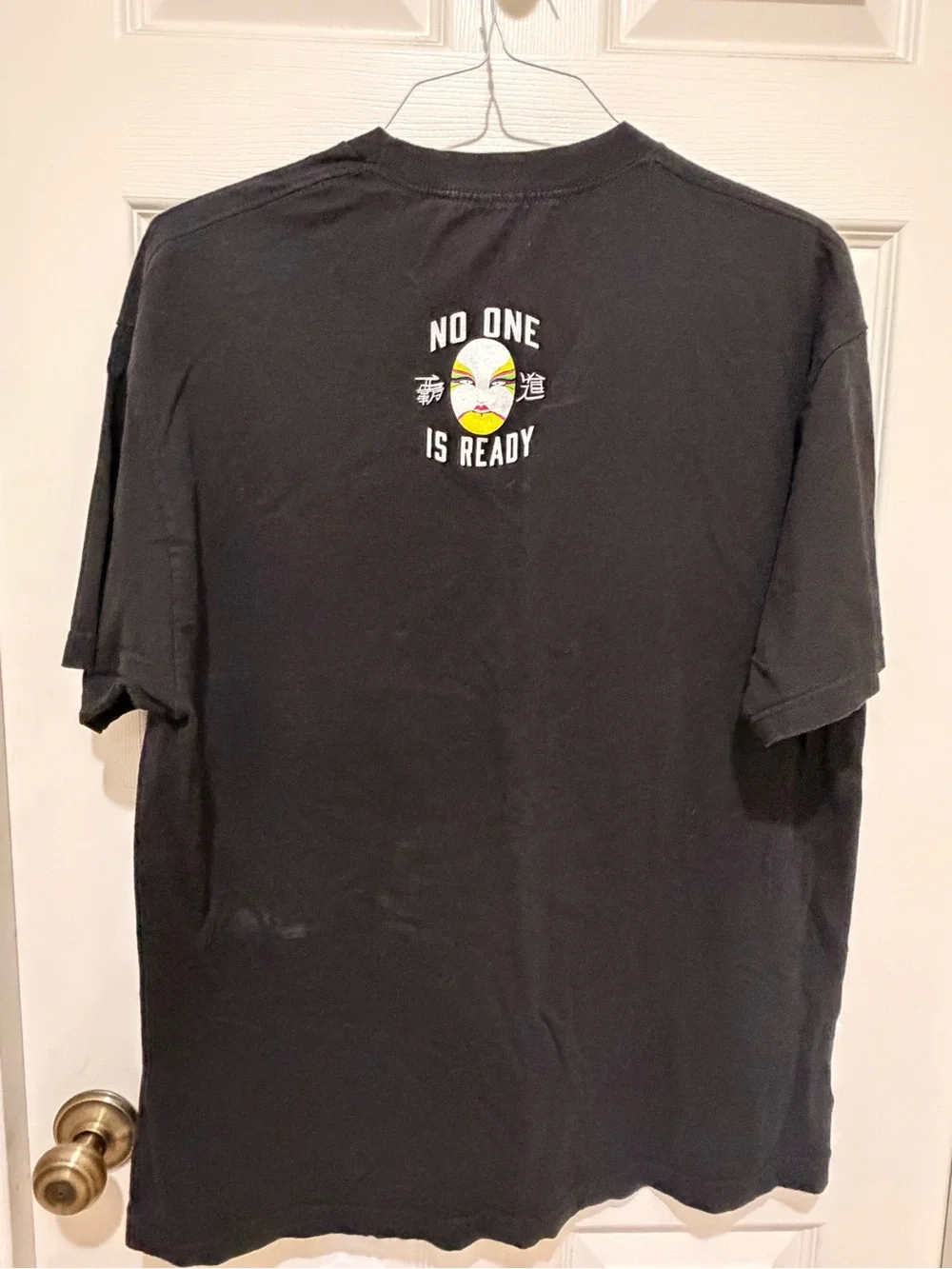 WWE Black Tee with Yellow, Pink, Green and Purple Theatrical Makeup Face